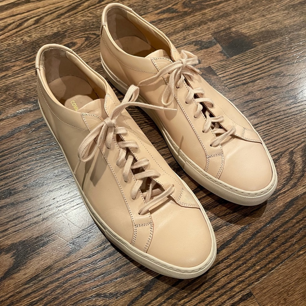 Men’s Common Projects original achilles pink sneakers.